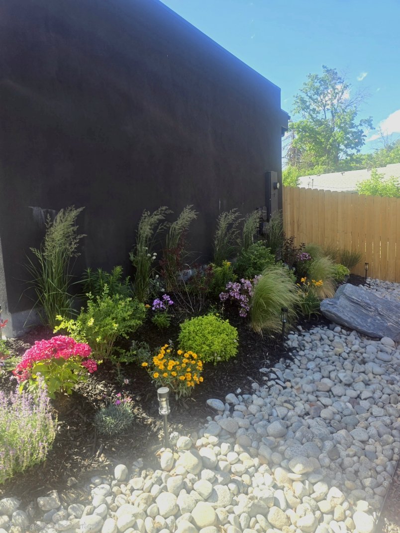 Stone path and garden by Elite Home Solutions